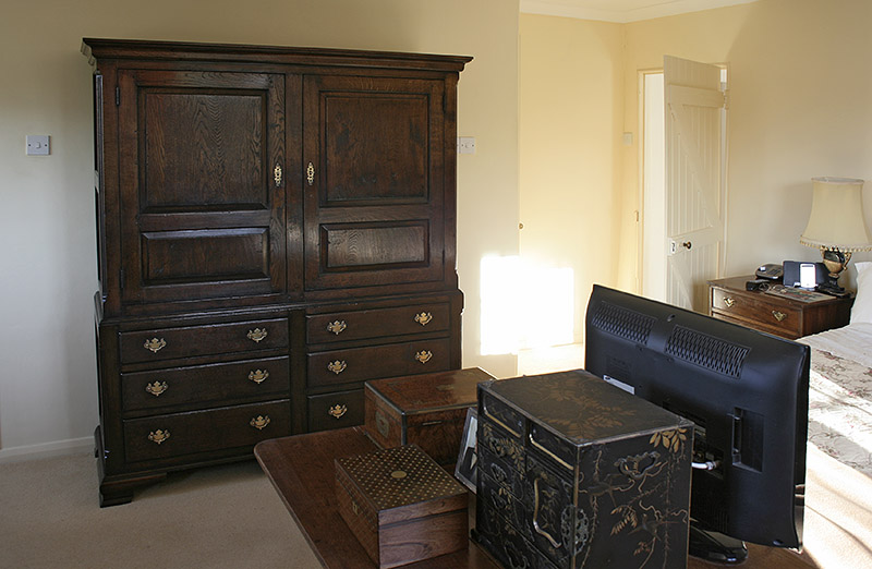 Dismantle-able oak linen press, successfully installed in bedroom of Somerset cottage