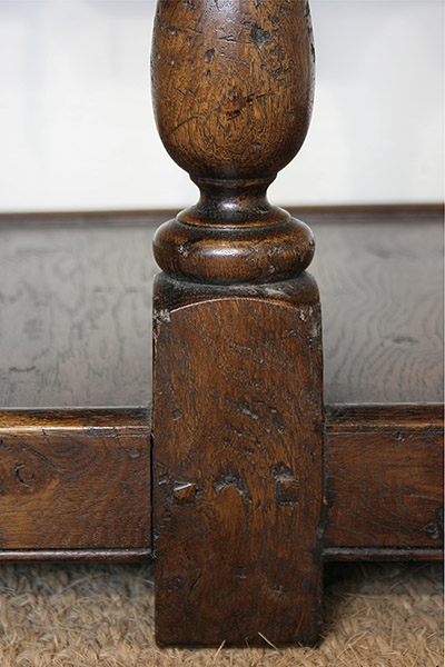 Leg detail of montgomeryshire oak potboard dresser base