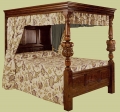 Reproduction Jacobean 17th century style handmade oak four poster bed.