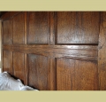 Oak tester bed headboard detail.