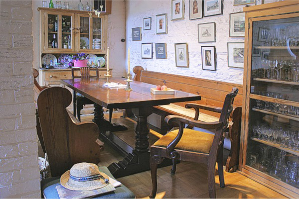 Period style bespoke oak pedestal dining table in the dining room of our clients Sussex country house.