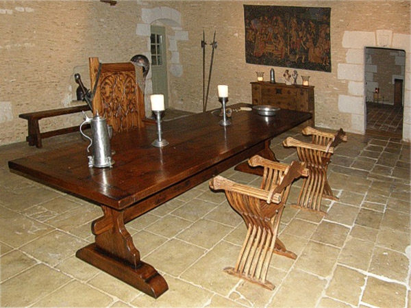 Medieval style oak trestle table in old French property