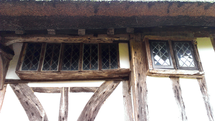 Diamond leaded windows above the great hall and service quarters of Alfriston Clergy House