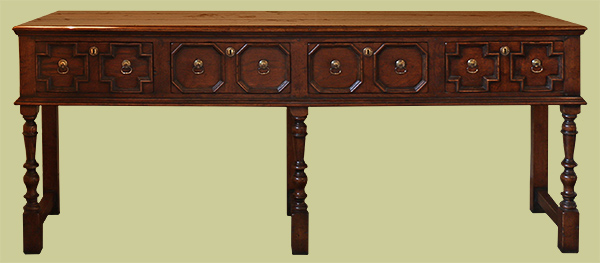 4 drawer Jacobean style oak open base low dresser.