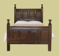 Period style oak bed with plain panels and square cut 16th century style finials.