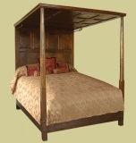 Oak panelled tester bed with octagonal cut tapered footposts 