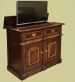 Montgomeryshire period style oak dresser base TV cabinet shown with TV fully extended.