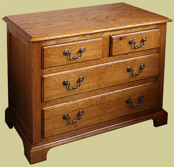 Double width 4-drawer traditional style bedside cabinet.