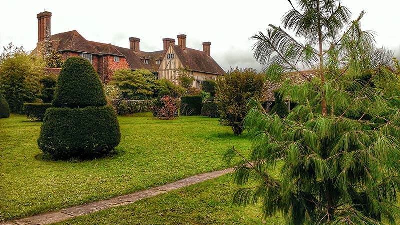 Great Dixter rear elevations, as seen from the Topiary Lawn