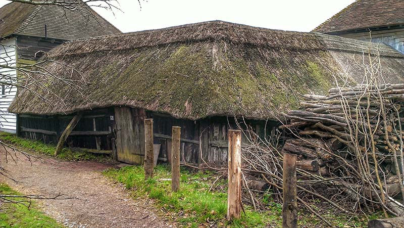 Thatched outbuilding between the Great Barn and ancillary farm buildings of Great Dixter