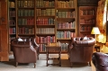 Oak games table in library of 17th century Sussex cottage