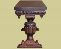 End view of 16th century Elizabethan style carved oak console table