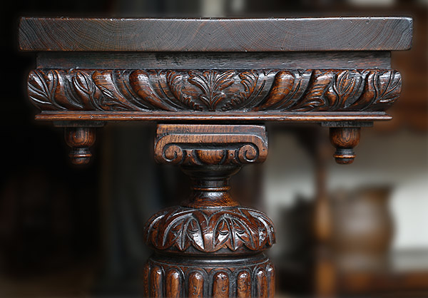 Pedestal carving detail on 16th century Elizabethan style carved oak console table