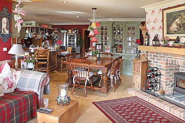 Wide heavy oak table in kitchen of Sussex beach front home