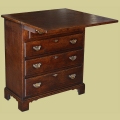 Period style oak bachelors chest of drawers with top folded open