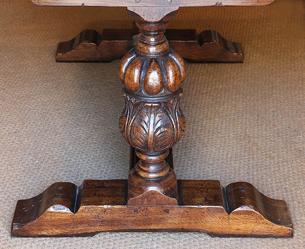 Detail of Elizabethan style oak pedestal table carved column