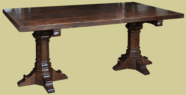 Medieval style bespoke made carved oak trestle table