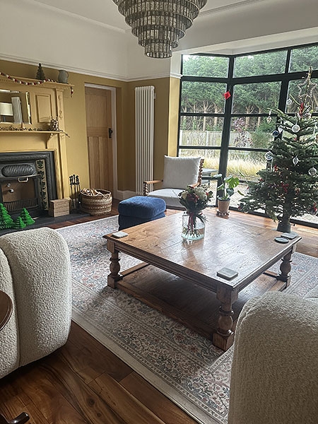 Period style oak potboard coffee table in traditional interior