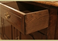 Closed oak dresser base detail