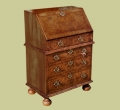 Change main image to Walnut veneered traditionally styled 5-drawer bureau. Walnut veneered traditionally styled 5-drawer bureau.